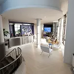 & Co Hotel